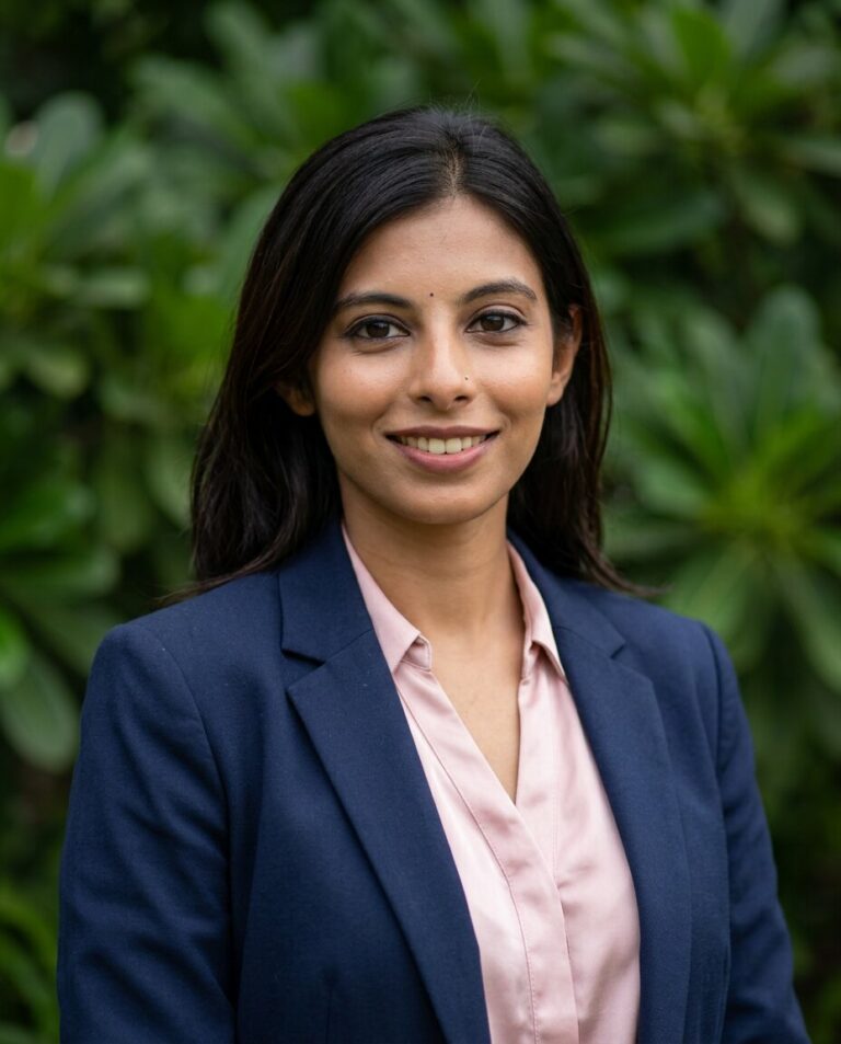 AI headshot example: Navy blazer, outdoor